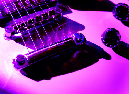 Pink Gibson style guitar